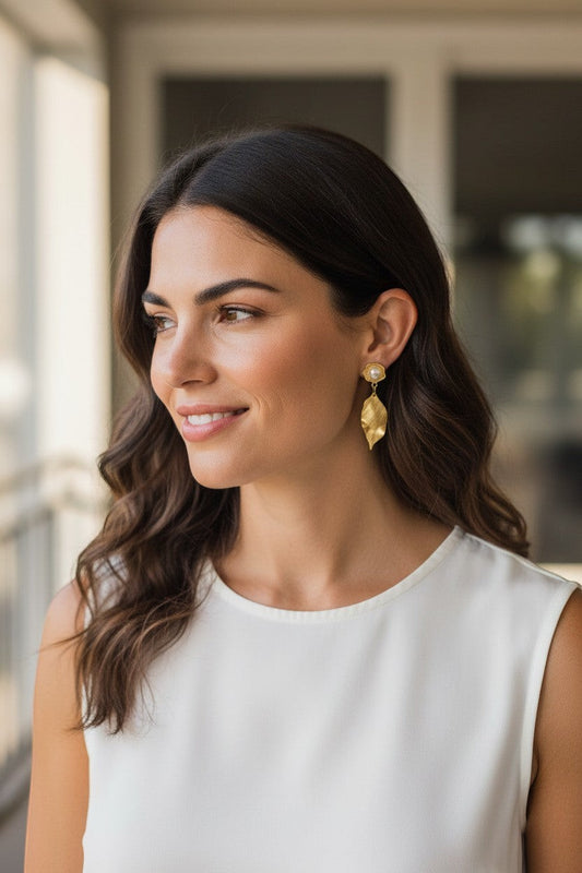 Lakelynns Designs gold leaf pearl drop earrings featuring a floral stud and textured leaf dangle. Elegant and timeless.
