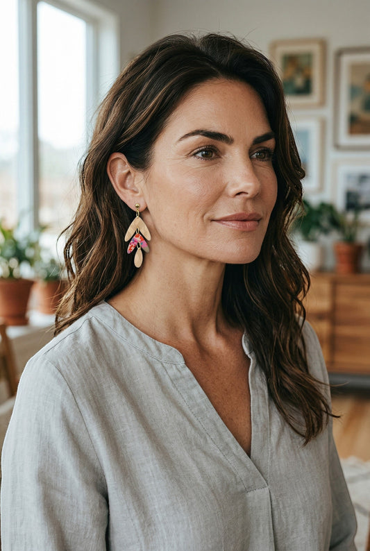 Lakelynns Designs abstract leaf dangle earrings in neutral tones with pink, teal, and coral accents. Lightweight and artistic.