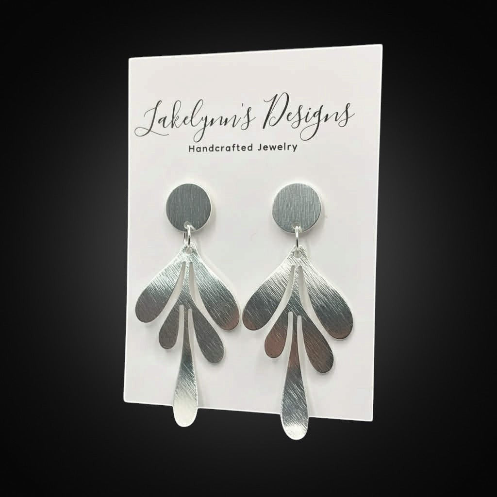 Lakelynns Designs brushed metal leaf drop earrings with a matte finish and nature-inspired design.