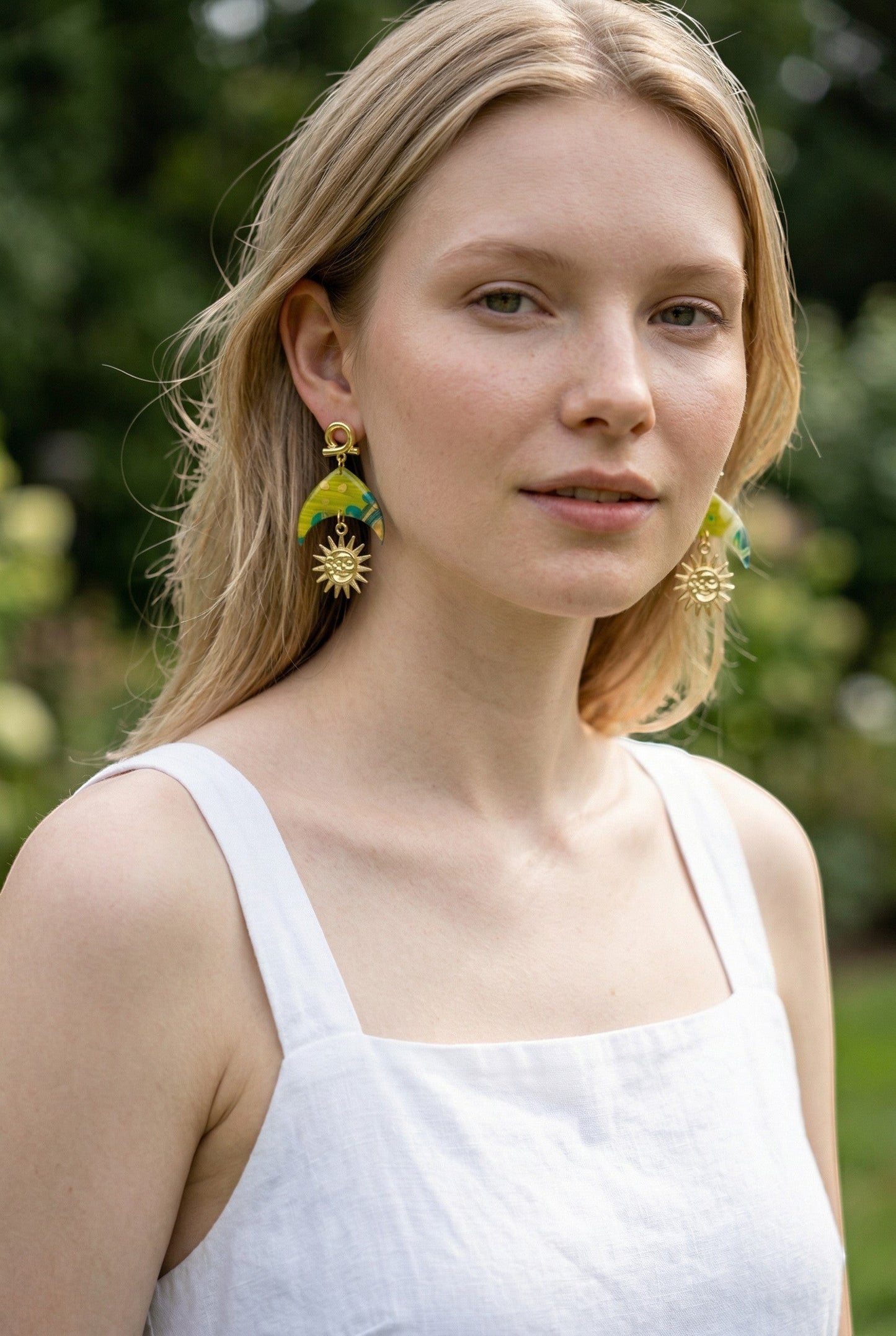 Lakelynns Designs Celestial Sun Dangle Earrings in lime green, teal, and gold. Lightweight polymer clay with gold-toned metal sun charms.