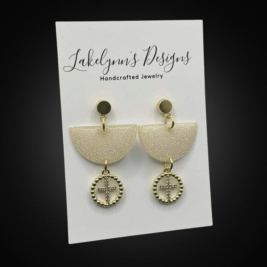 Lakelynns Designs champagne glitter semi-circle earrings with gold-tone cross charm dangle.
