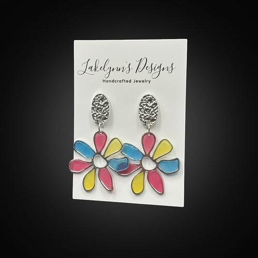 Lakelynns Designs colorful flower dangle earrings with pink, yellow, and blue petals and textured silver tops.