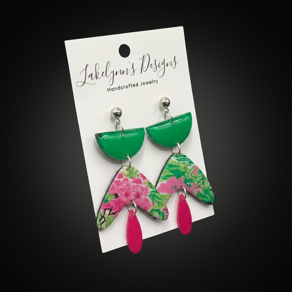 Lakelynns Designs abstract floral dangle earrings in green, pink, and fuchsia with geometric shapes.