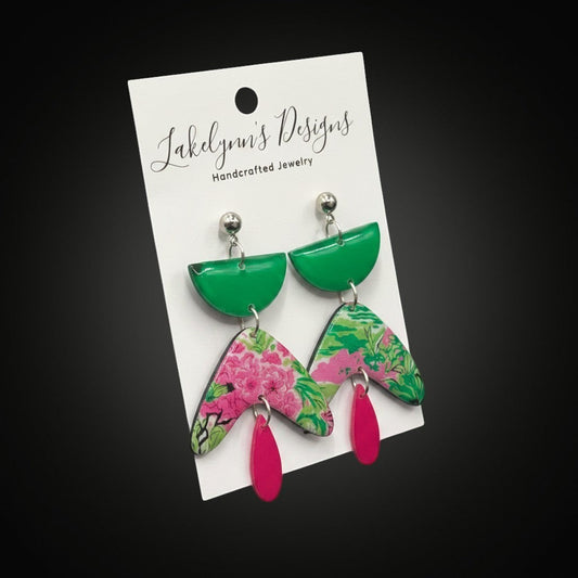 Lakelynns Designs abstract floral dangle earrings in green, pink, and fuchsia with geometric shapes.