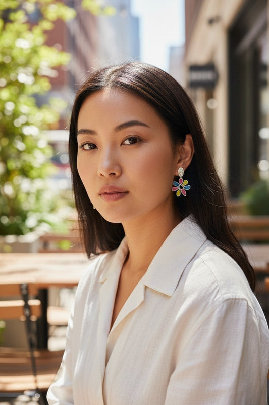 Lakelynns Designs colorful flower dangle earrings with pink, yellow, and blue petals and silver tops.