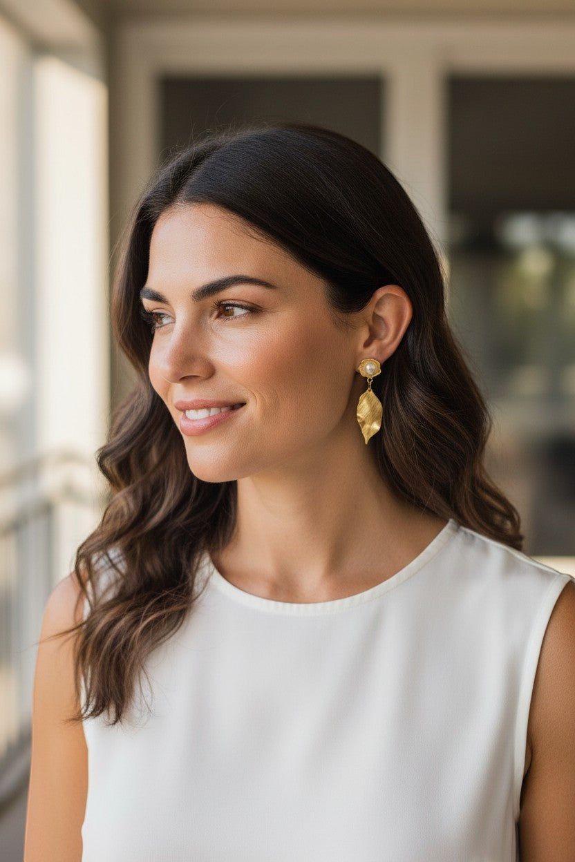 Lakelynns Designs gold leaf pearl drop earrings featuring a floral stud and textured leaf dangle. Elegant and timeless.