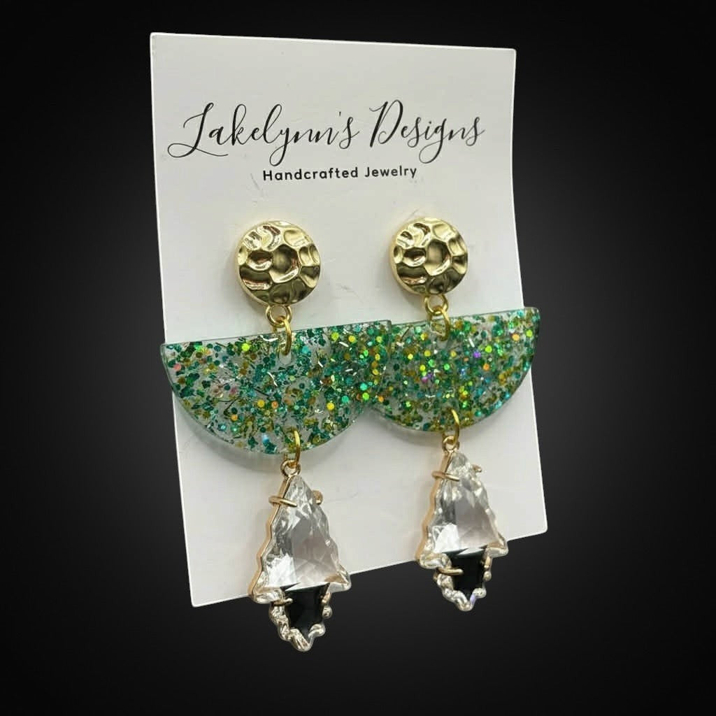 Lakelynns Designs emerald green glitter half moon resin earrings with clear crystal dangles and gold studs.
