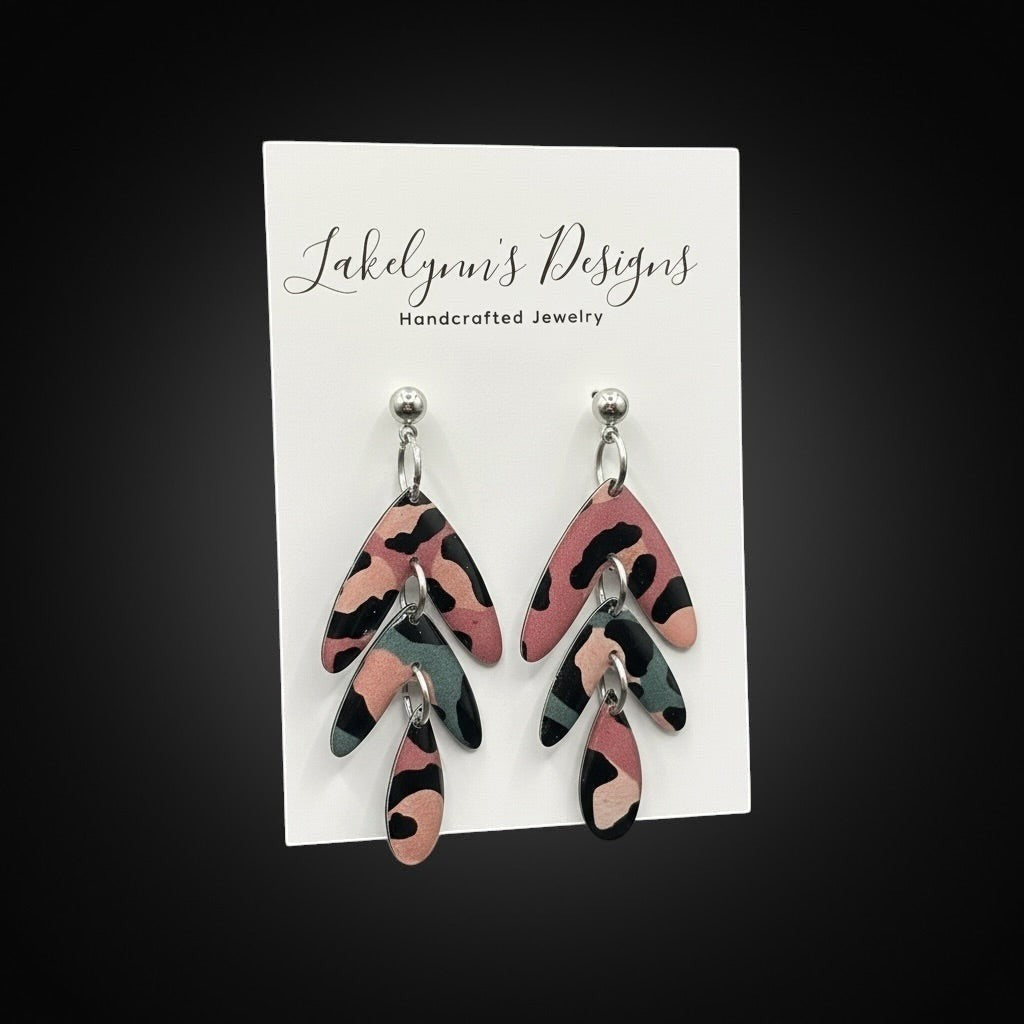 Lakelynns Designs Harlow patterned dangle earrings in muted rose, teal, and beige with layered leaf design.