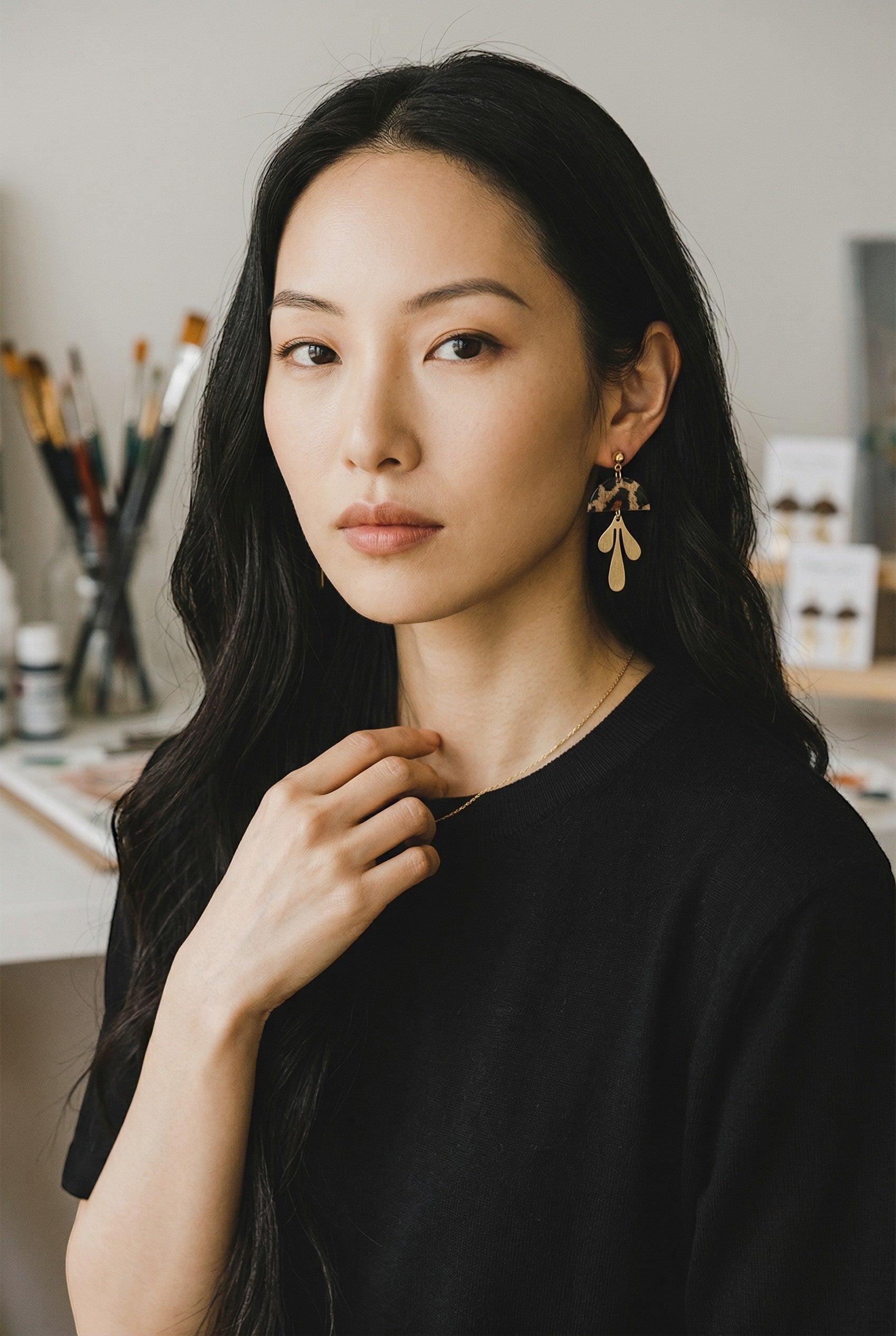 Lakelynns Designs Raya Leopard Print Dangle Earrings with abstract gold charm. Leopard print acrylic top.