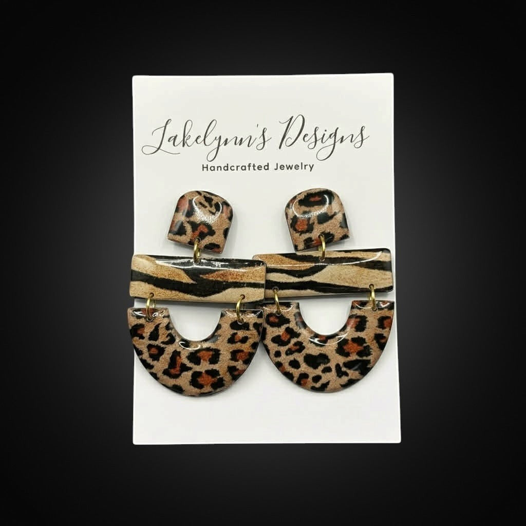 Lakelynns Designs Ella Leopard Print Statement Earrings with layered rectangular and semi-circular drops.