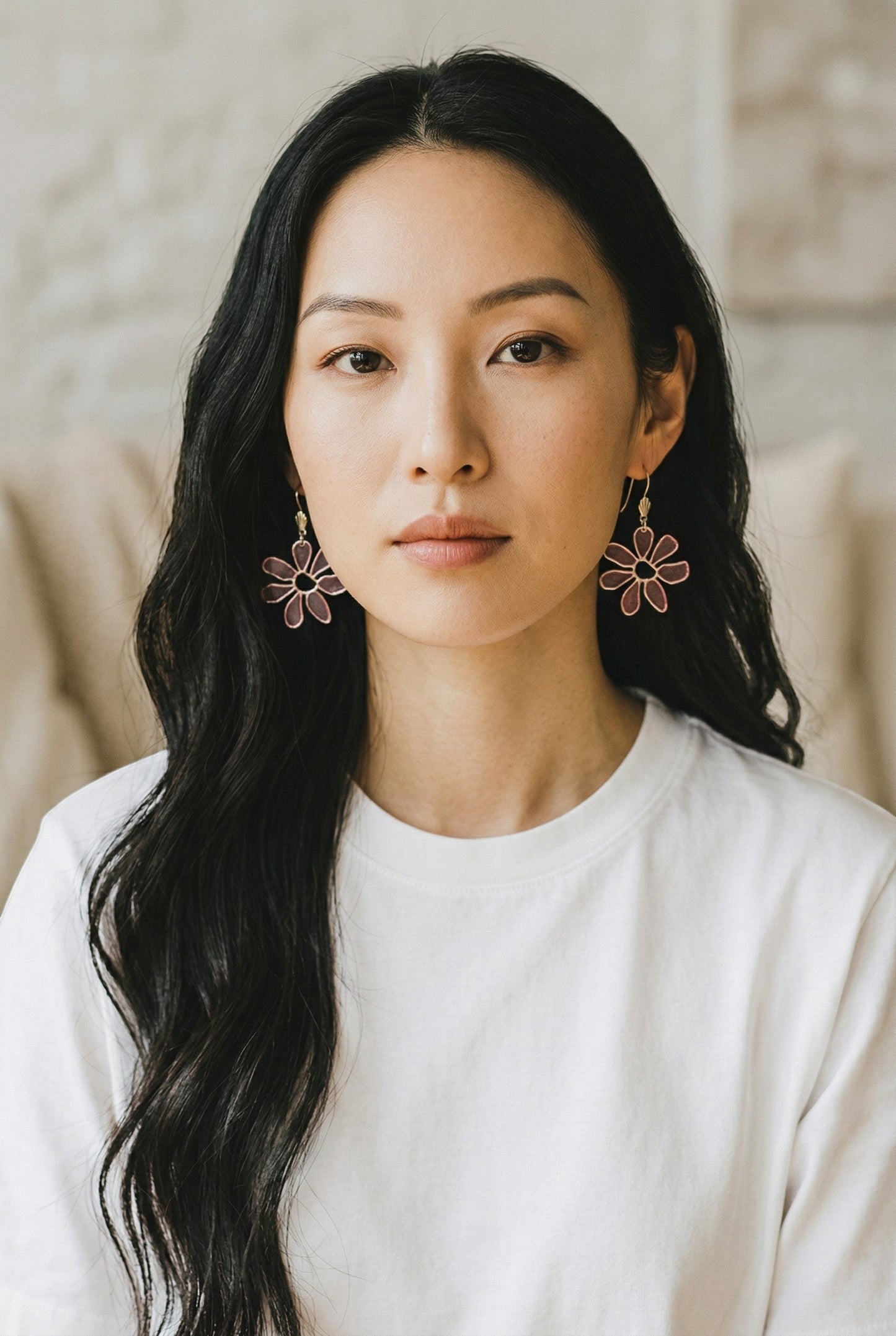 Lakelynns Designs Lila Bloom Flower Dangle Earrings in translucent pink with dark metallic border and lever-back closure.