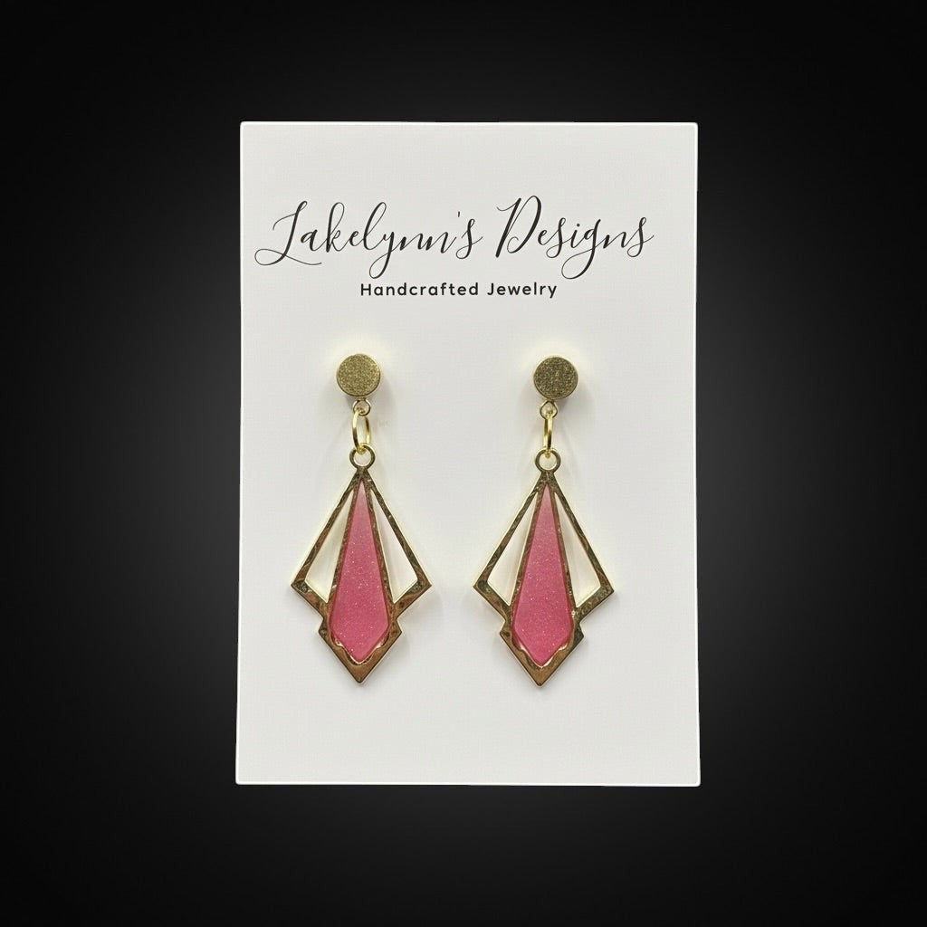 Lakelynns Designs Lila Dangle Earrings: Geometric gold-tone art deco design with shimmering pink inlay. Lightweight dangle style.