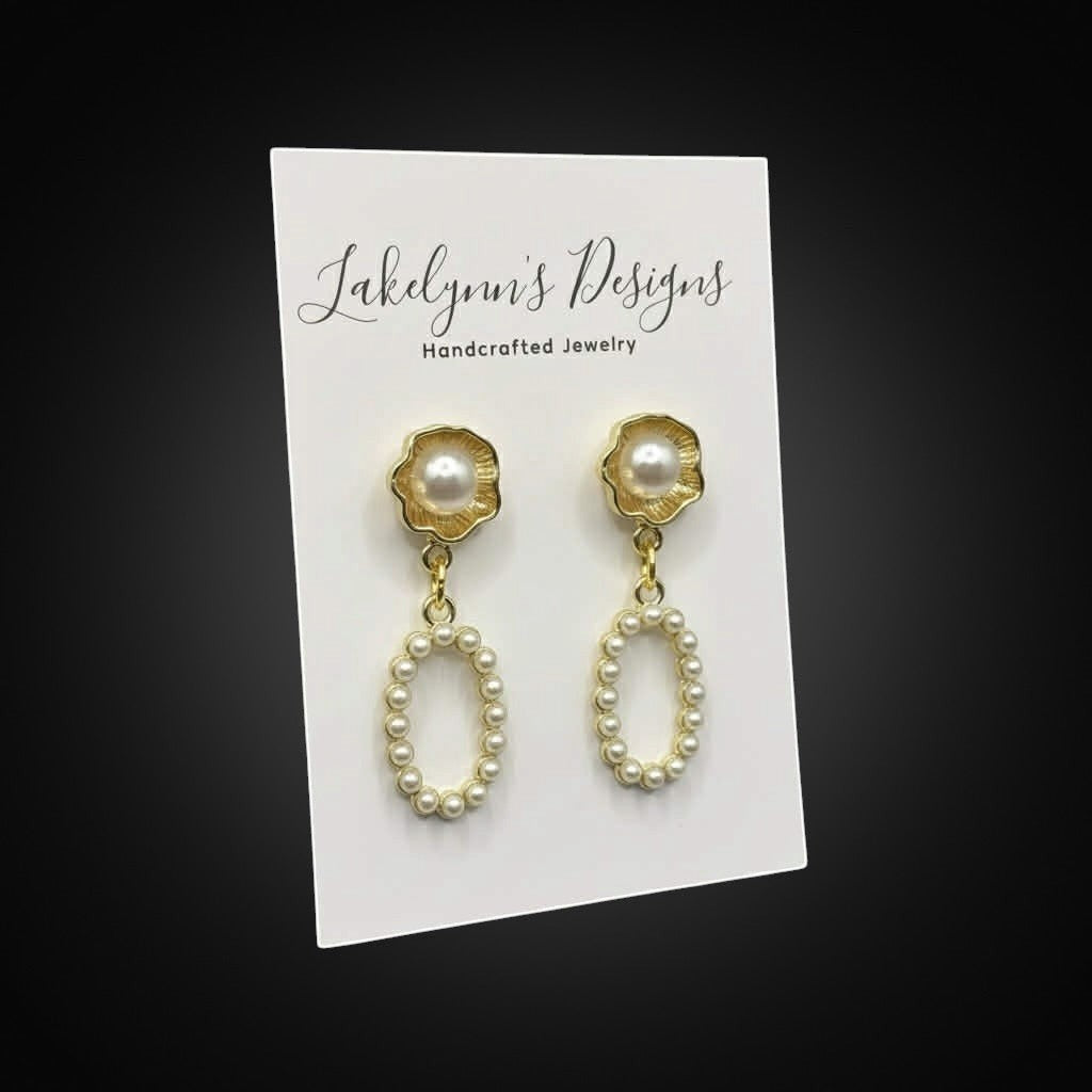 Lakelynns Designs gold-tone oval pearl drop earrings with floral stud and intricate pearl detailing.