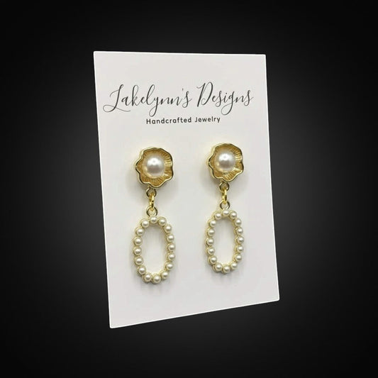 Lakelynns Designs gold-tone oval pearl drop earrings with floral stud and intricate pearl detailing.