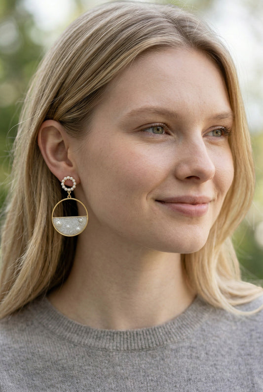 Lakelynns Designs gold-tone hoop dangle earrings with white resin and faux pearls. Circular stud top.