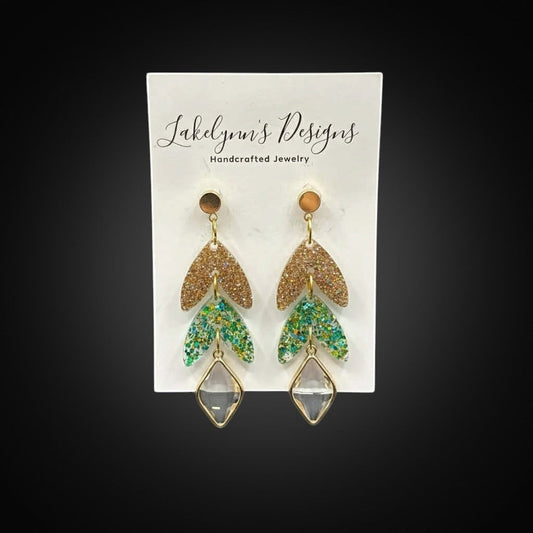 Lakelynns Designs Quinn Dangle Leaf Earrings with gold glitter top leaf and green/teal glitter lower leaves, clear diamond charm.