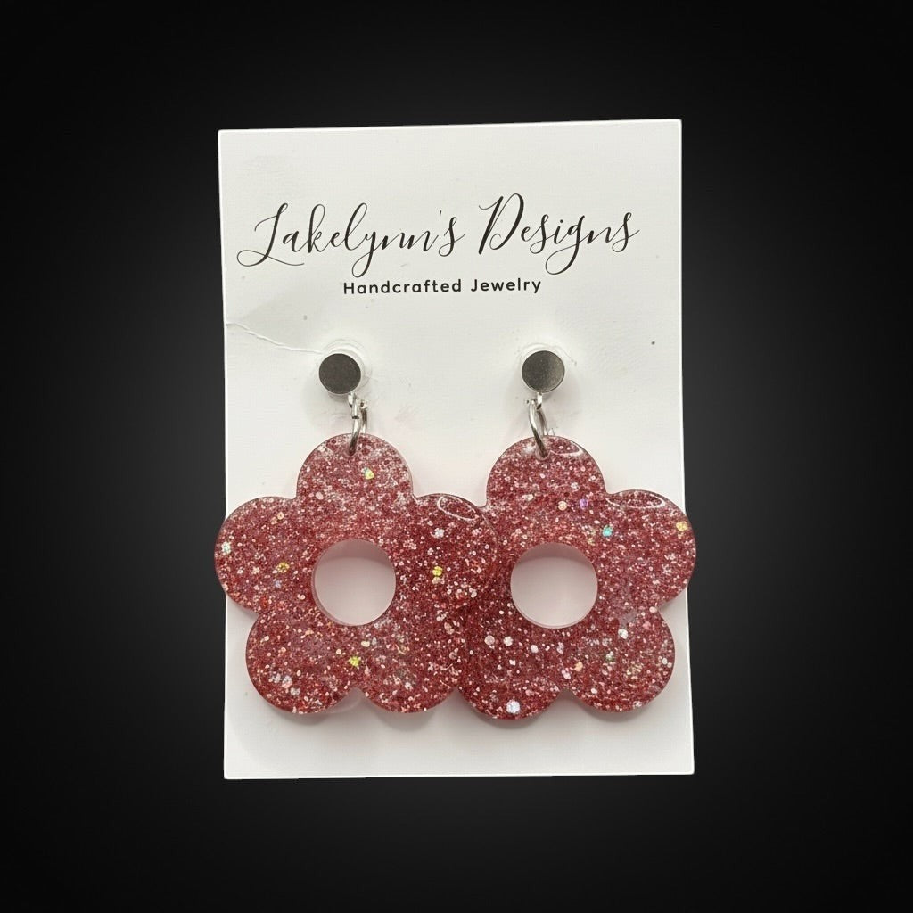 Lakelynns Designs rose gold glitter flower earrings with iridescent flecks and a central cutout. Retro statement jewelry.