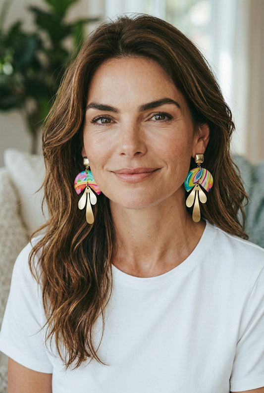 Lakelynns Designs Tiff abstract dangle earrings with colorful swirls and brass-toned leaves.